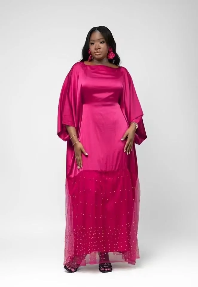 Robe fuchsia, cape et jupe en tulle
